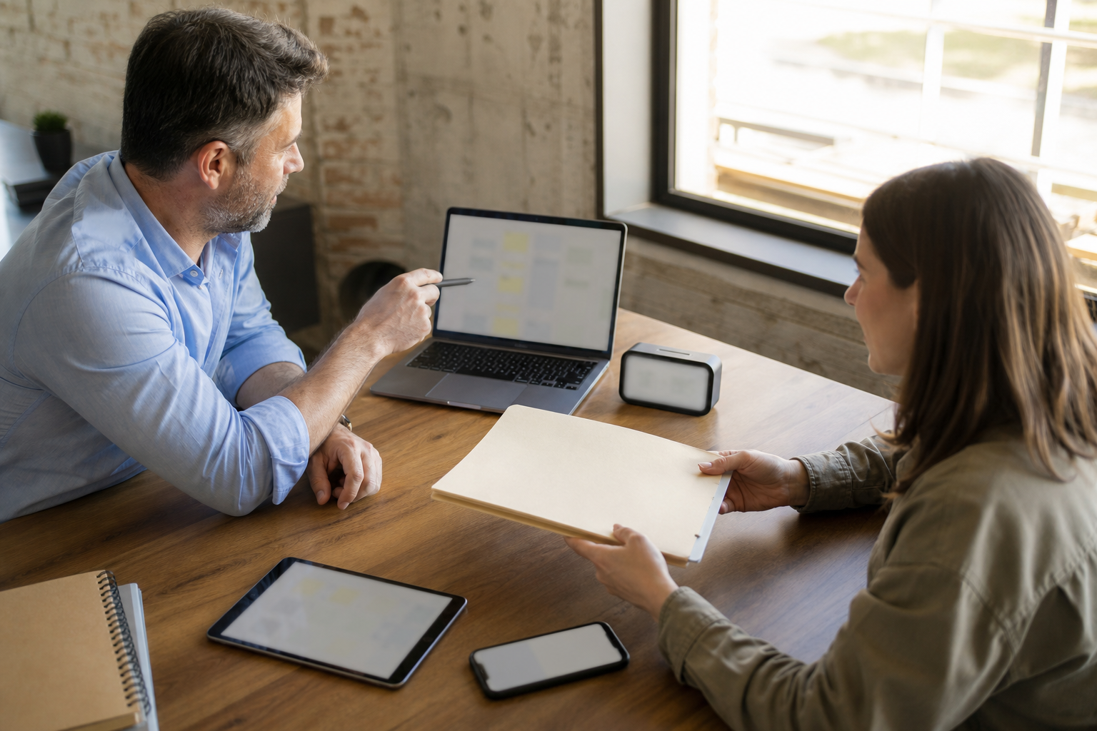 Marketing coordinator handing off multi-clinic timezone schedule details with labeled calendar screens